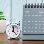 monthly calendar with clock