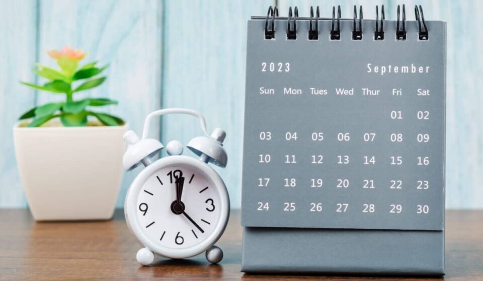 monthly calendar with clock