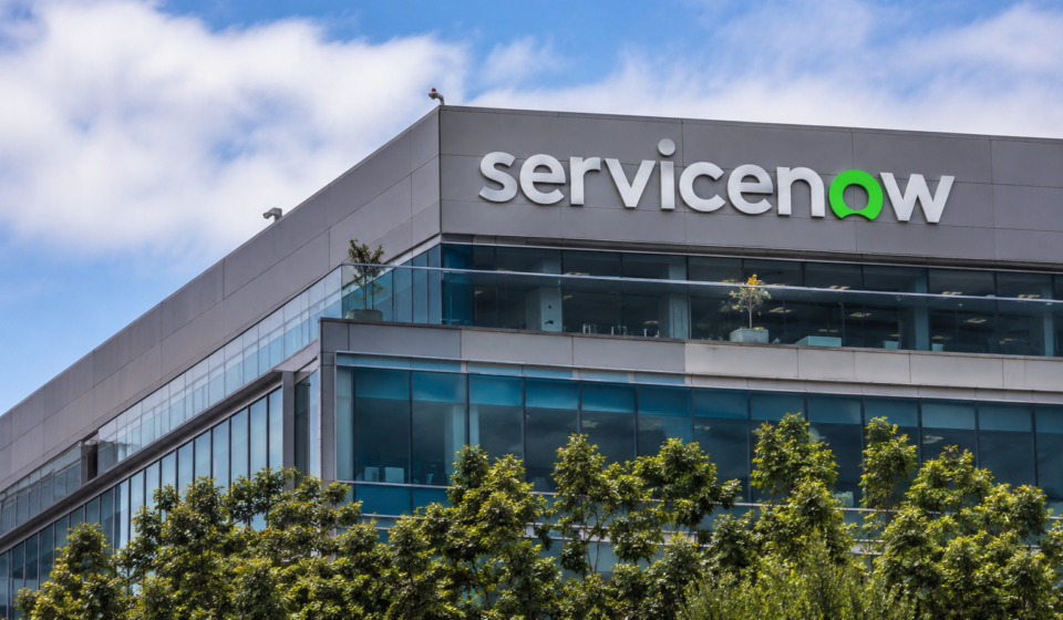 ServiceNow logo displayed on the exterior of a modern office building.