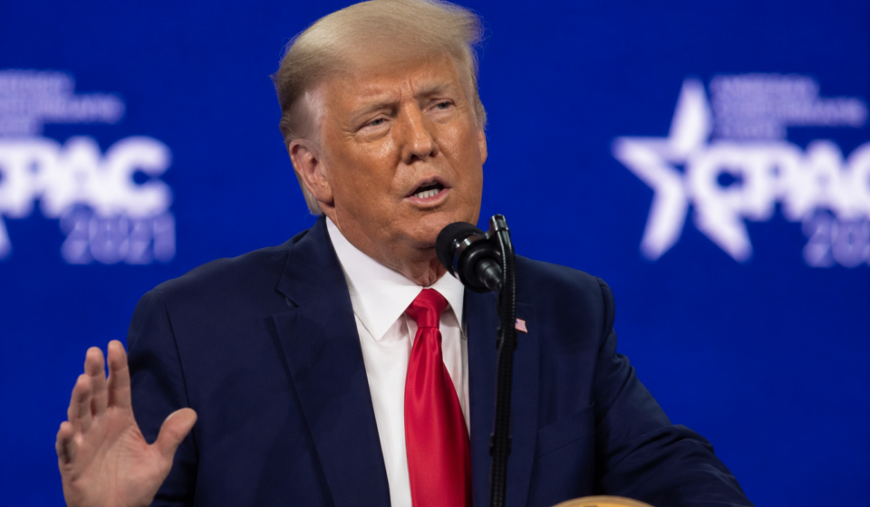 Donald Trump speaking at a conference