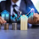 The Home Buyers’ Plan Limit is $60,000, and This Mortgage Lender Could Benefit Real estate investment concept with person pointing on growth graph and coin stacking to get profit from property